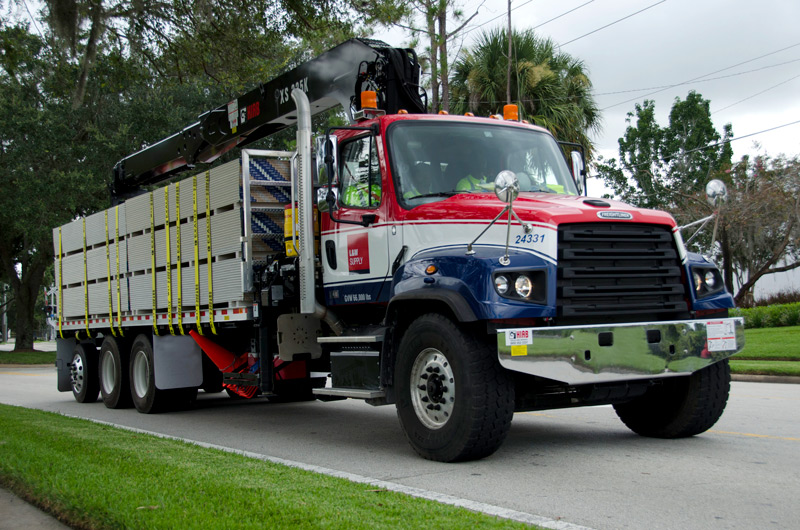 L&W Supply Delivery Truck on suburban street