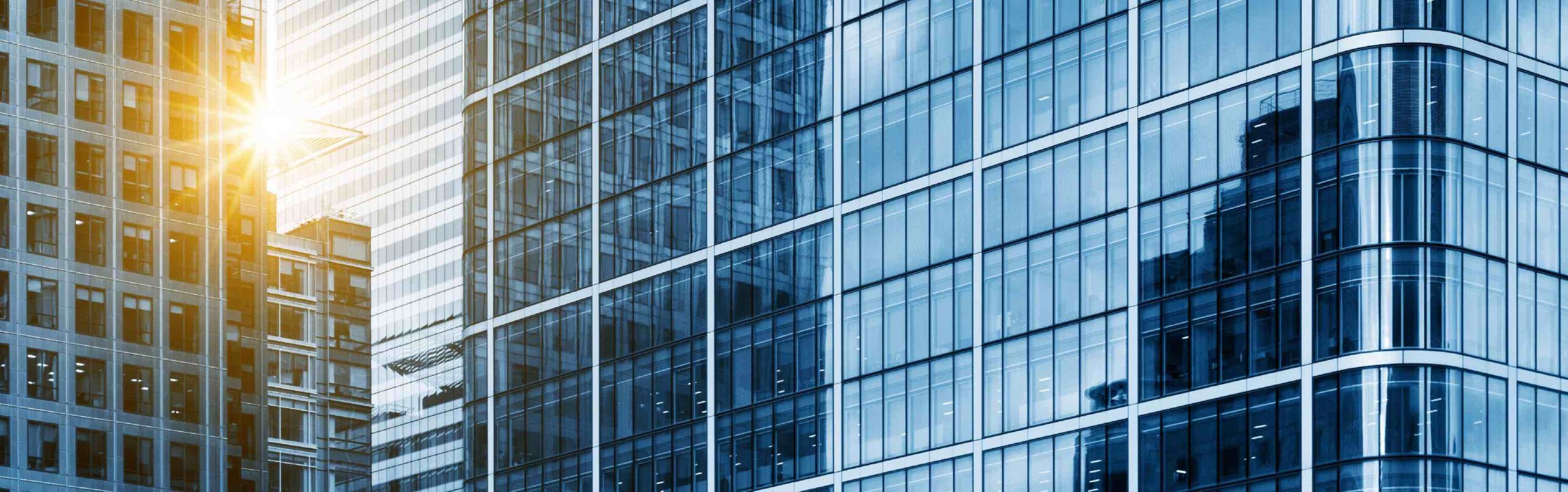 Hi-rise buildings with sun reflection