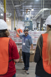 National Gypsum Employee takes L&W Supply Associates through plant