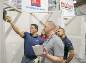 National Gypsum Employee demonstrates the application of ProForm