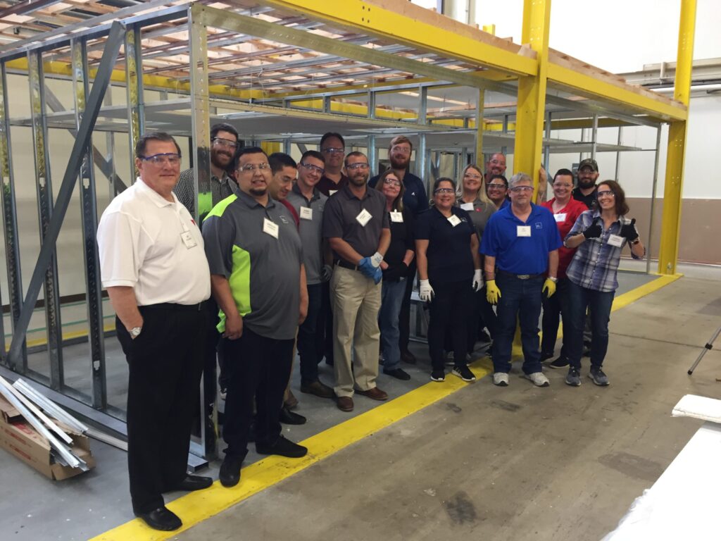 L&W Supply and USG in Ceilings Training Group photo at construction site