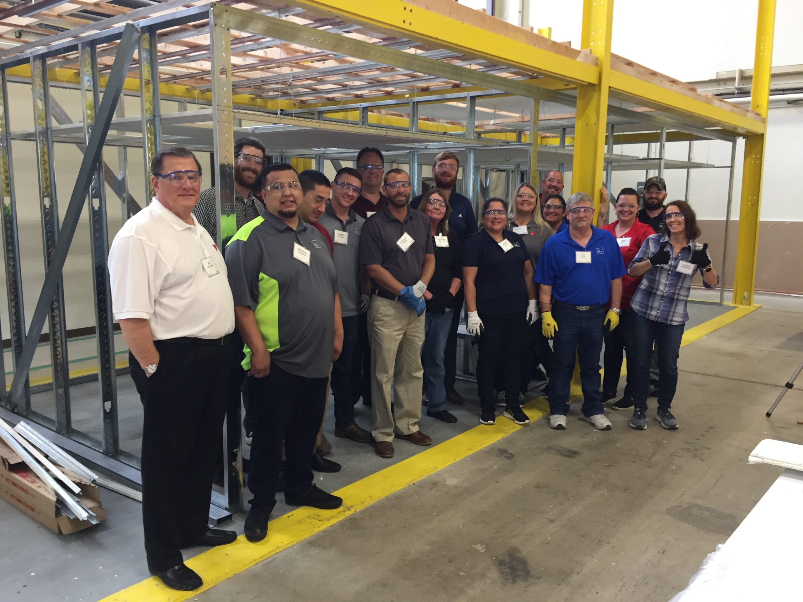L&W Supply and USG in Ceilings Training Group photo at construction site