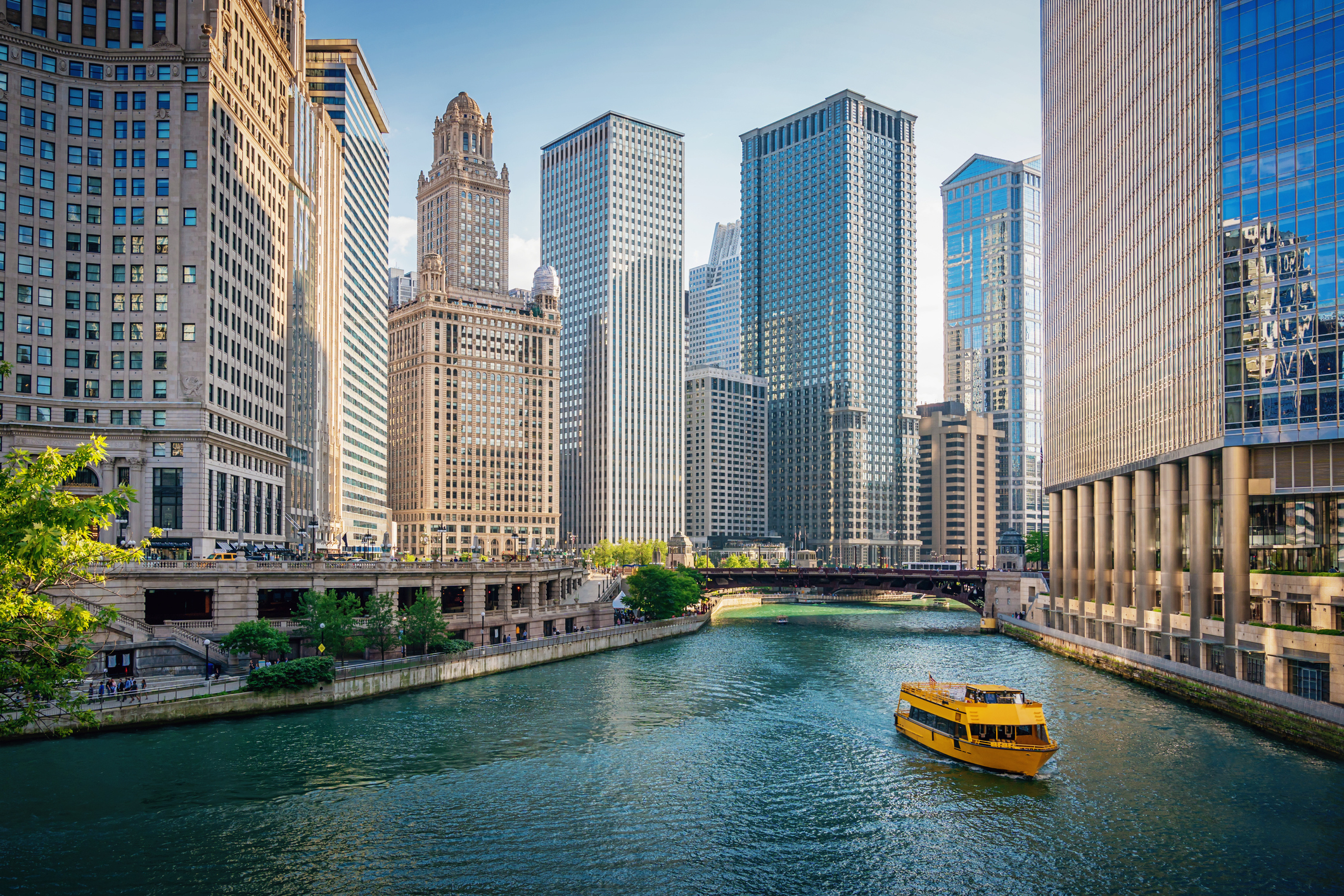 Chicago Riverboat sailing on Chicago River with Skyscrapers nearby