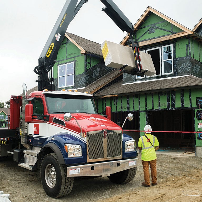 ABC Supply Interiors Truck Delivering Wallboard