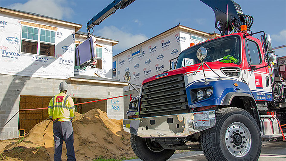 L&W Supply Truck Delivering Drywall to a Jobsite